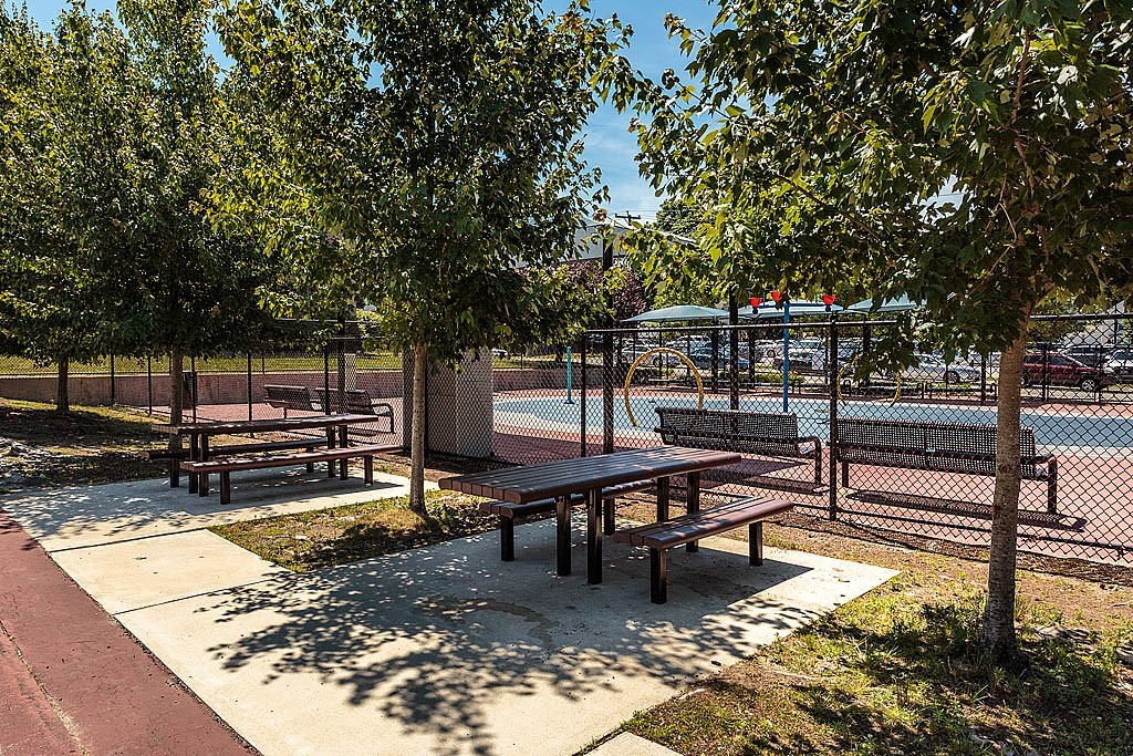 17 Ash Street Waltham, MA 02453 - Photo 30 of 32 a view of a bench in the patio