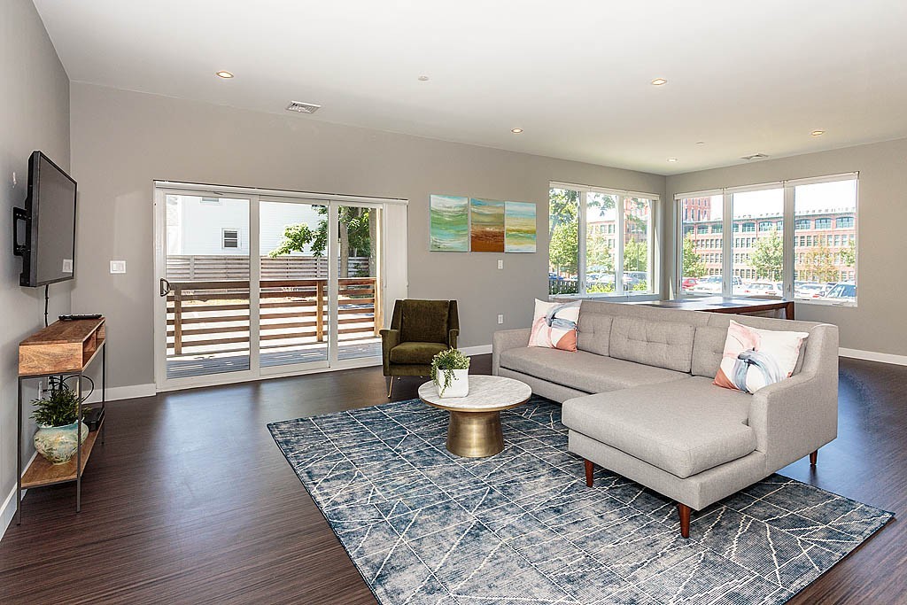 17 Ash Street Waltham, MA 02453 - Photo 3 of 32 a living room with furniture and a wooden floor