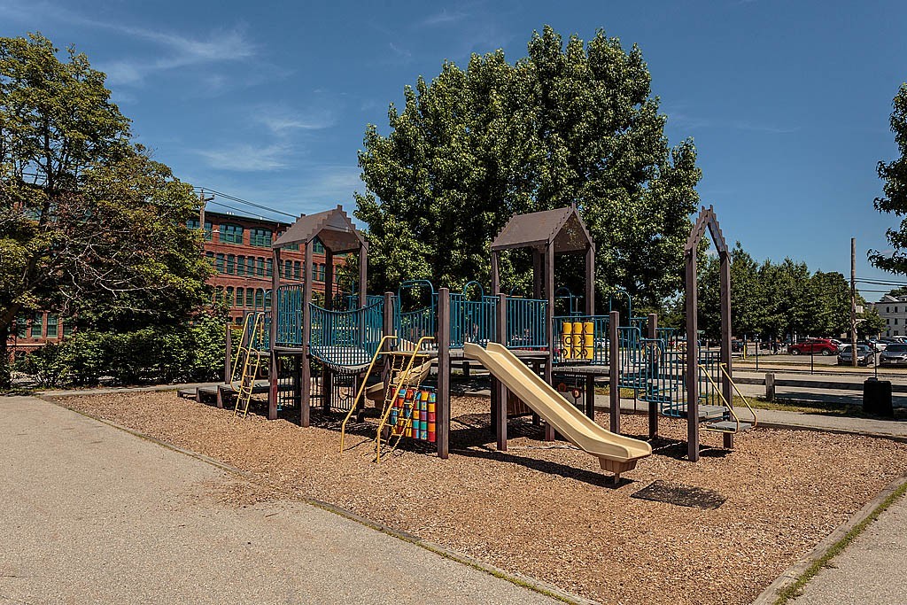 17 Ash Street Waltham, MA 02453 - Photo 31 of 32 a view of a park with iron fence