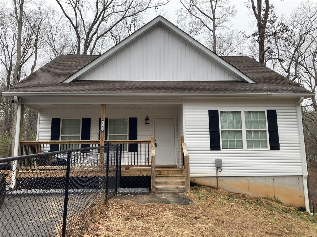 3780 Highway 52 Dahlonega, GA 30533 - Photo 19 of 19 a front view of a house with balcony
