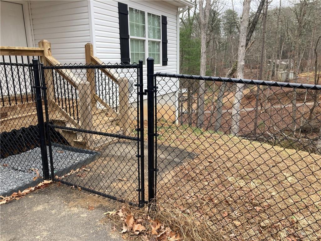 3780 Highway 52 Dahlonega, GA 30533 - Photo 3 of 19 a view of a balcony with a pot
