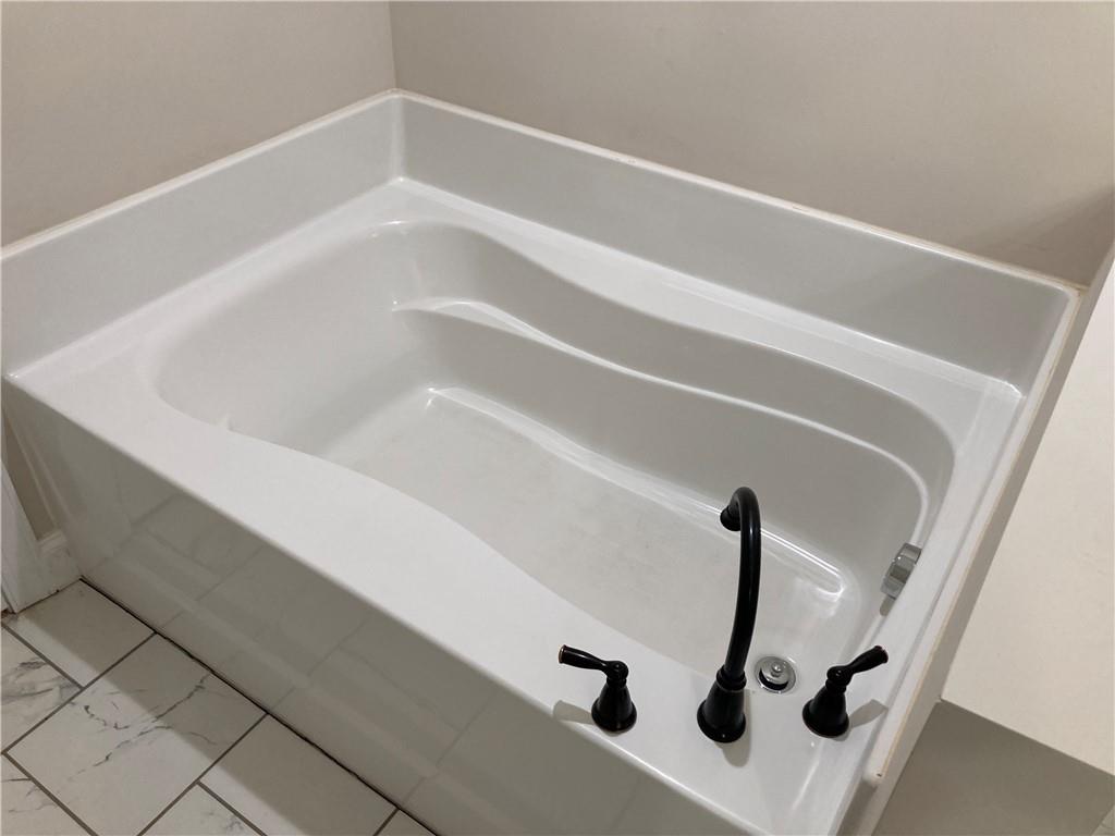 3780 Highway 52 Dahlonega, GA 30533 - Photo 10 of 19 a bathroom with a bathtub