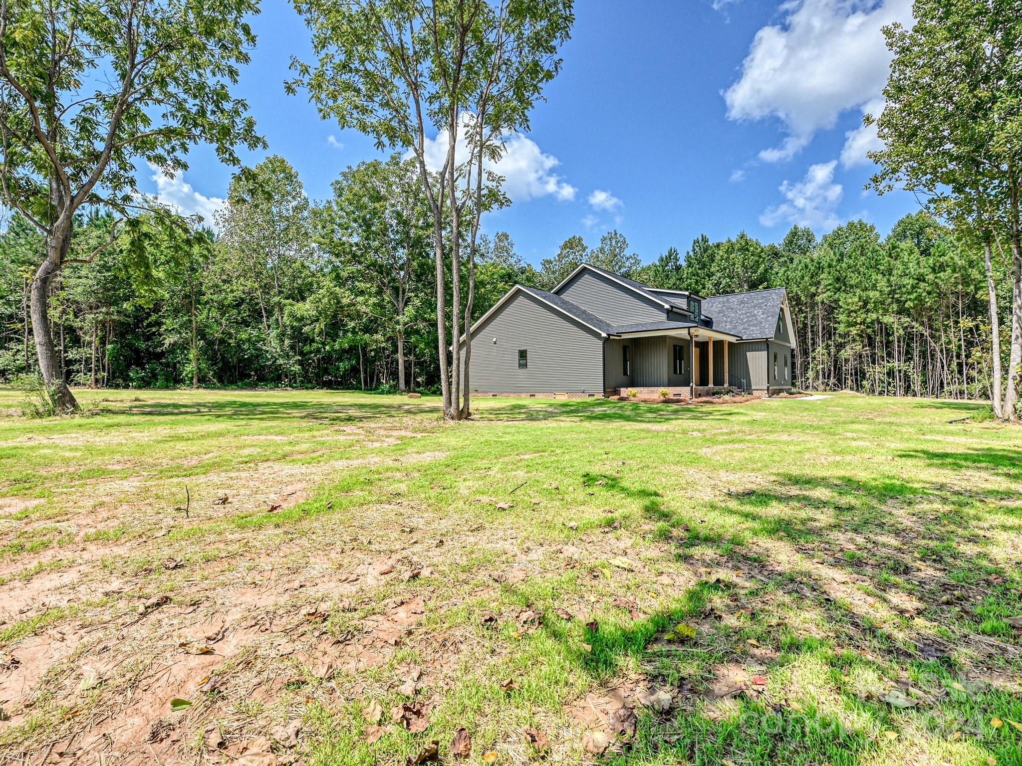 1438 Edgefield Road York, SC 29745 - Photo 33 of 36 a house with swimming pool in front of it