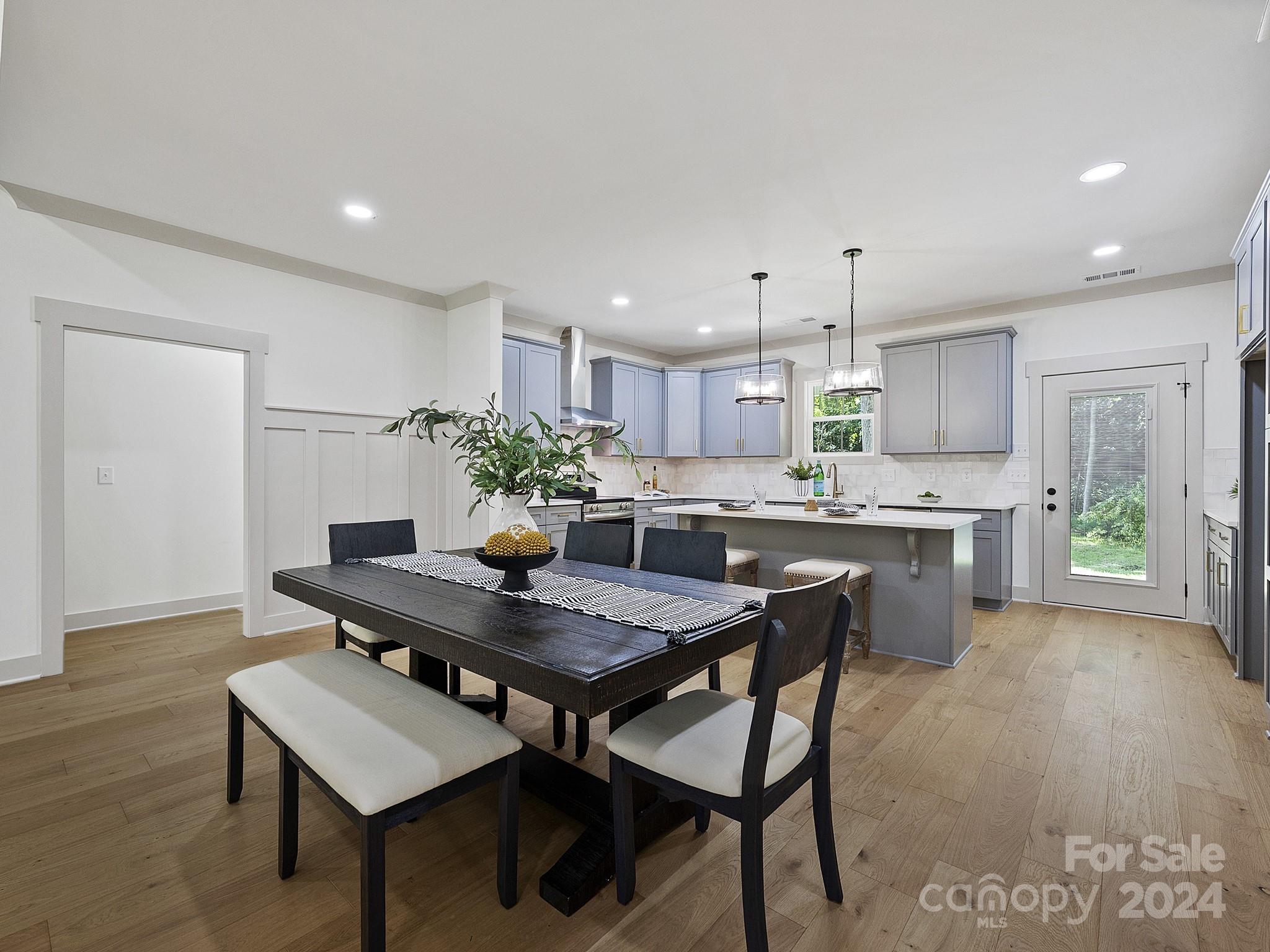1438 Edgefield Road York, SC 29745 - Photo 7 of 36 a kitchen with a table and chairs in it