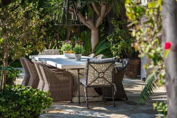 a view of a patio with couches and chairs