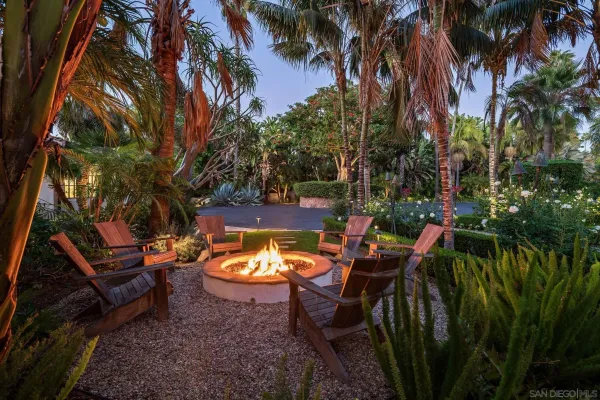 a view of backyard with green space