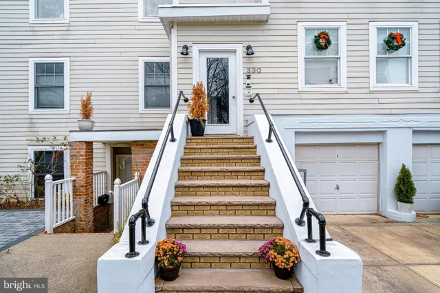 a view of a house with a bench