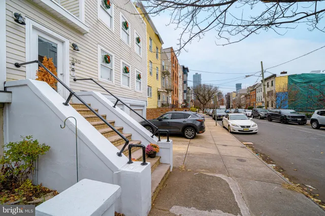 a view of a street with cars