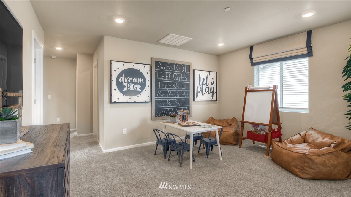 1376 Baker Hts Loop Bremerton, WA 98312 - Photo 11 of 19 a dining room with furniture and a window