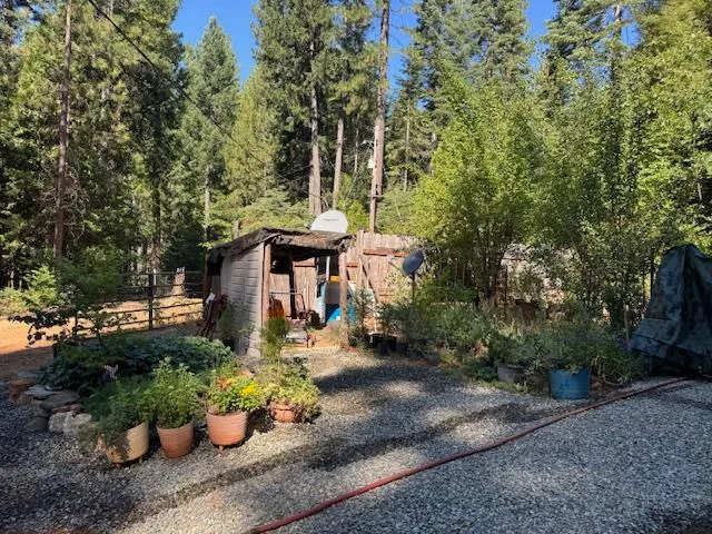 a backyard of a house with lots of green space