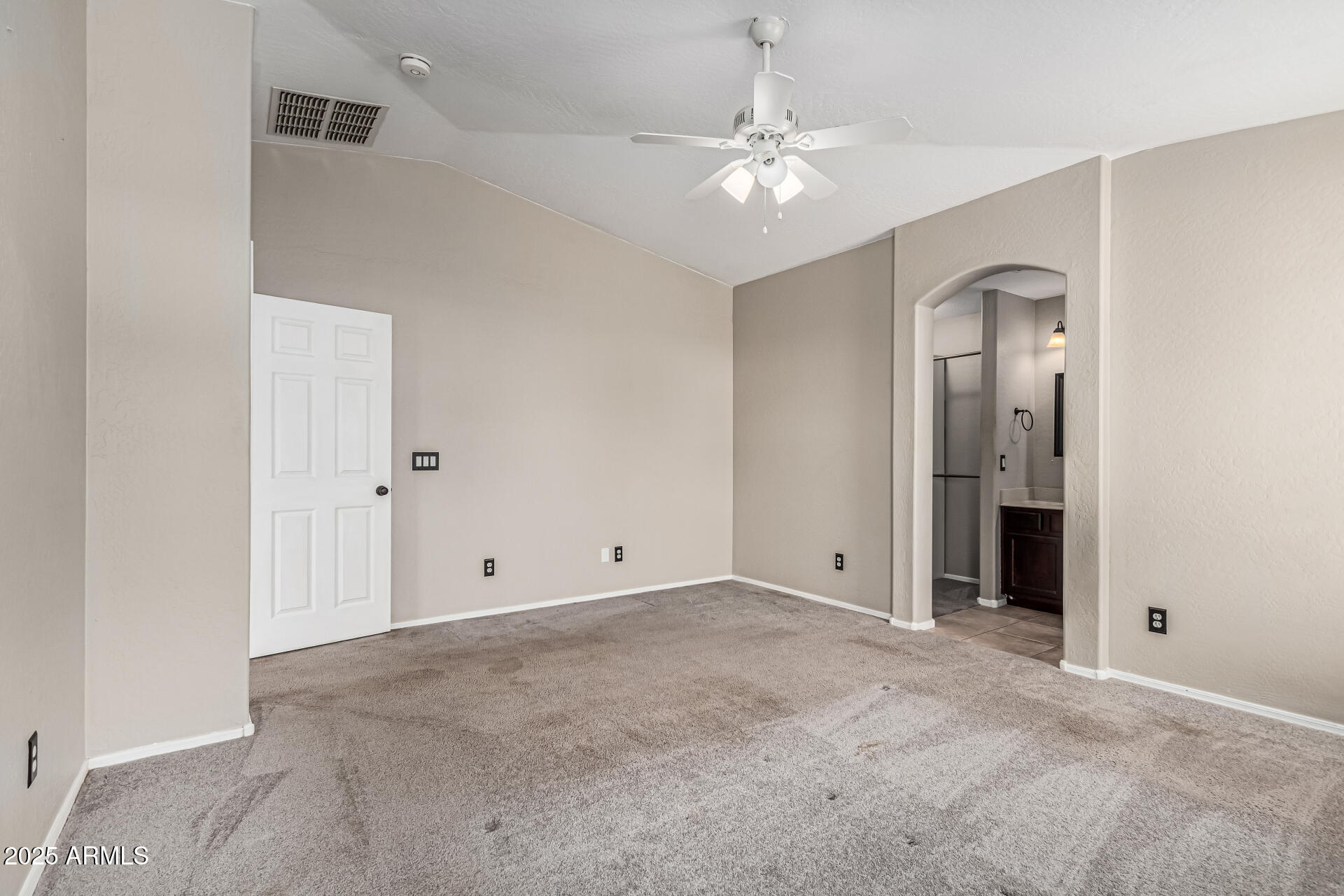 1634 East Harwell Road Phoenix, AZ 85042 - Photo 18 of 44 a view of an empty room with chandelier fan