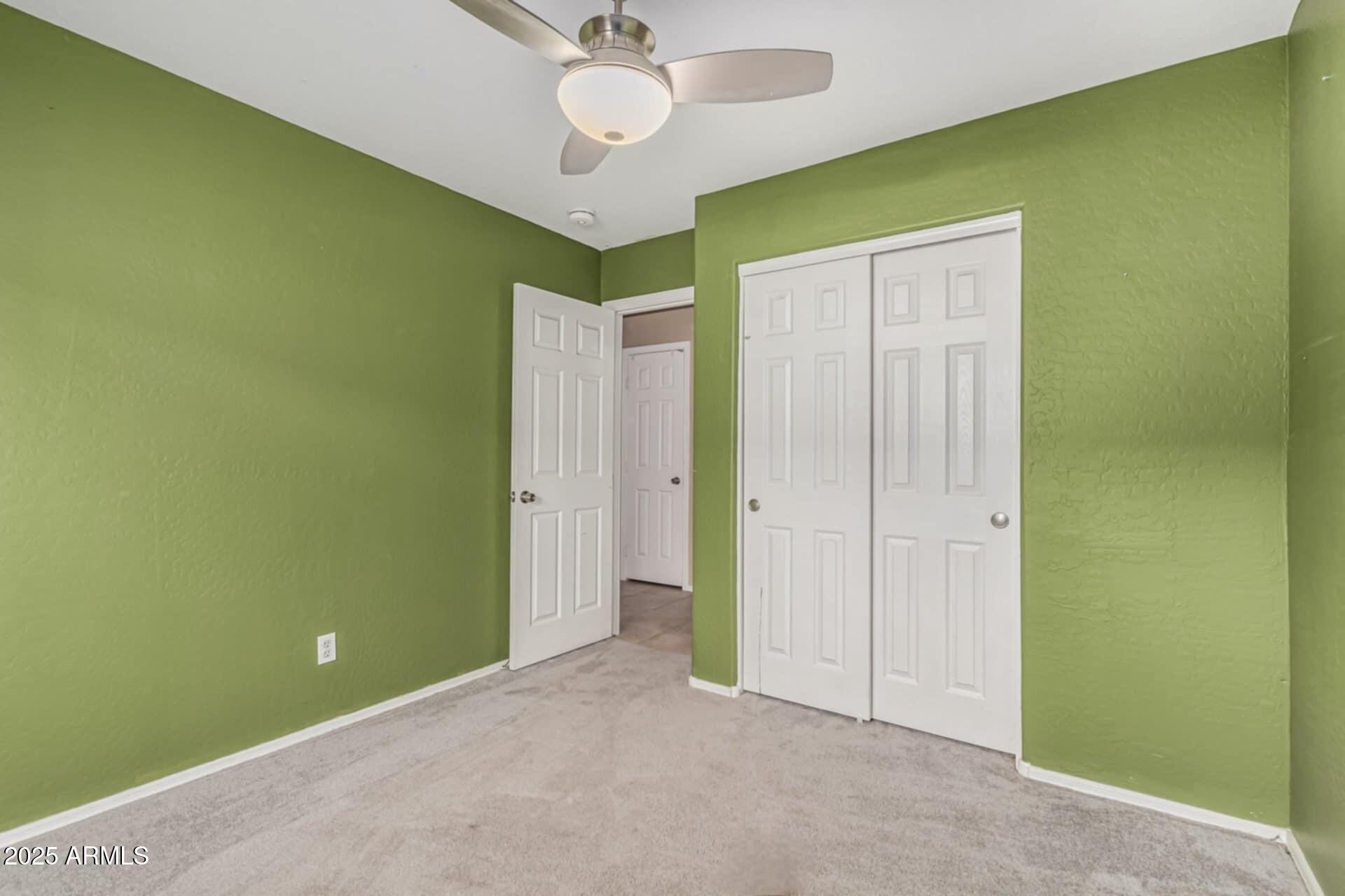 1634 East Harwell Road Phoenix, AZ 85042 - Photo 26 of 44 a view of an empty room with a window