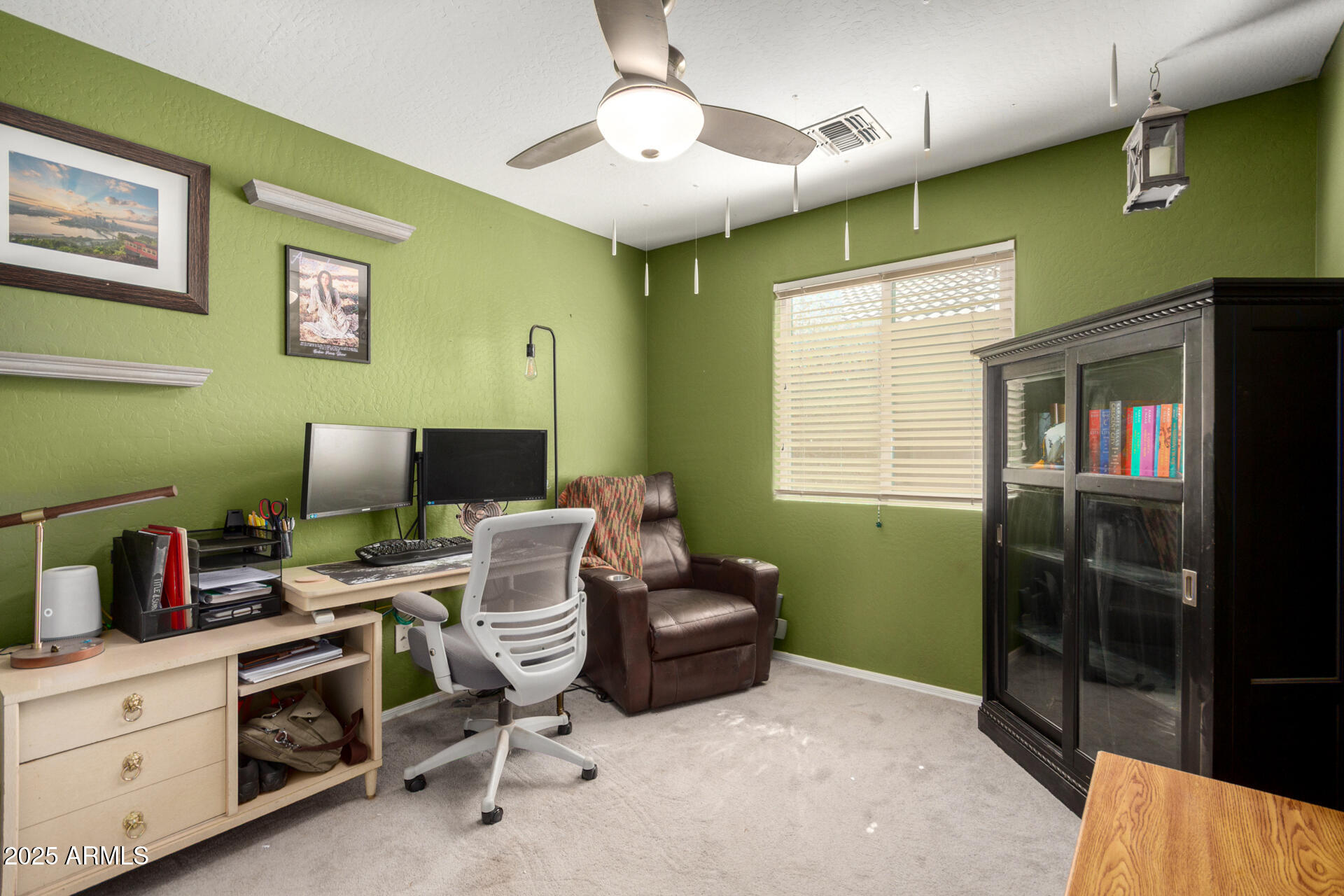 1634 East Harwell Road Phoenix, AZ 85042 - Photo 27 of 44 a workspace with furniture and a window