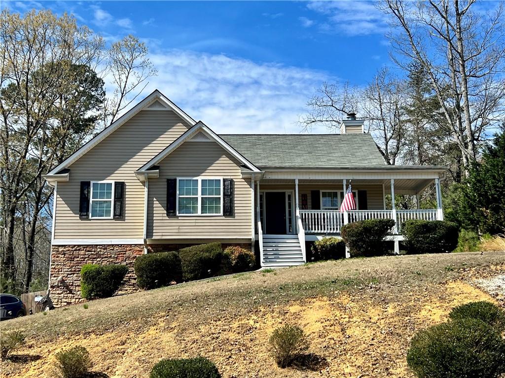 134 Levi Street Southwest Calhoun, GA 30701 - Photo 1 of 1 a front view of a house with a yard