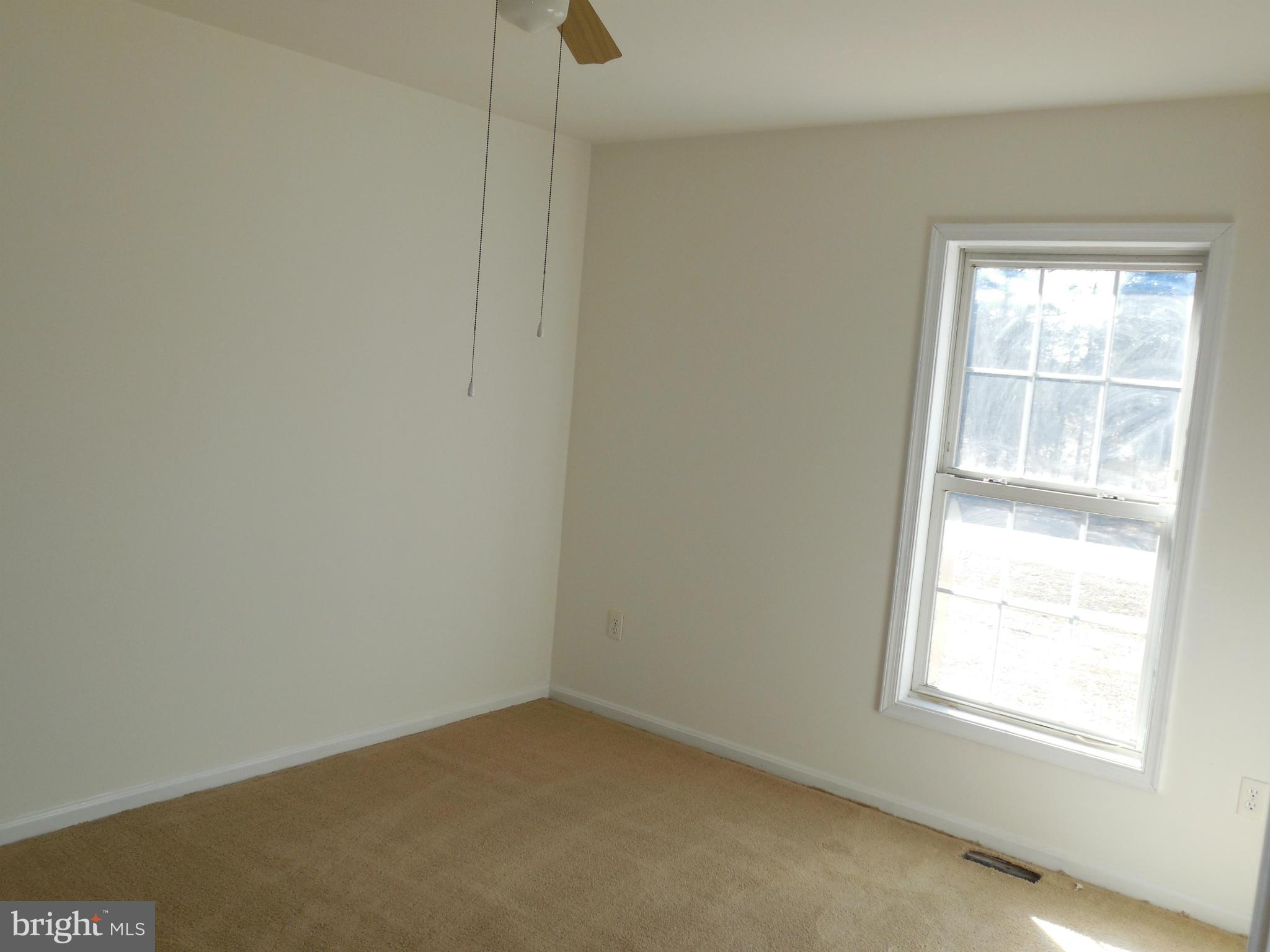 275 Cedar Ridge Drive Ruther Glen, VA 22546 - Photo 16 of 25 an empty room with a window