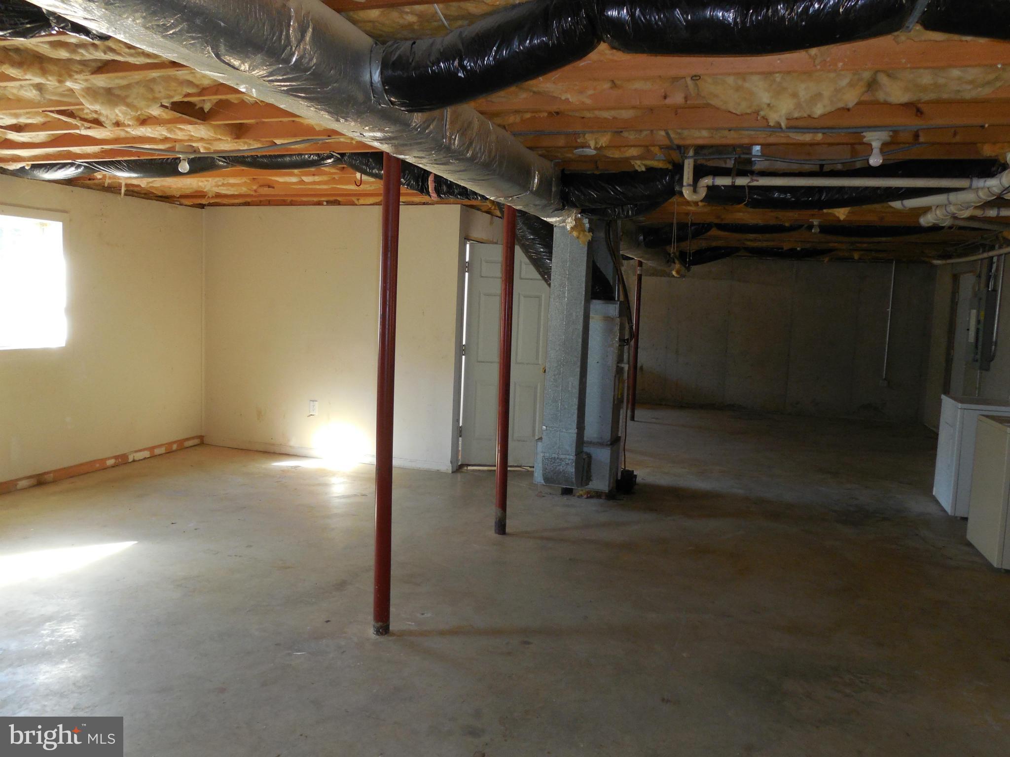 275 Cedar Ridge Drive Ruther Glen, VA 22546 - Photo 23 of 25 a view of a garage of the house