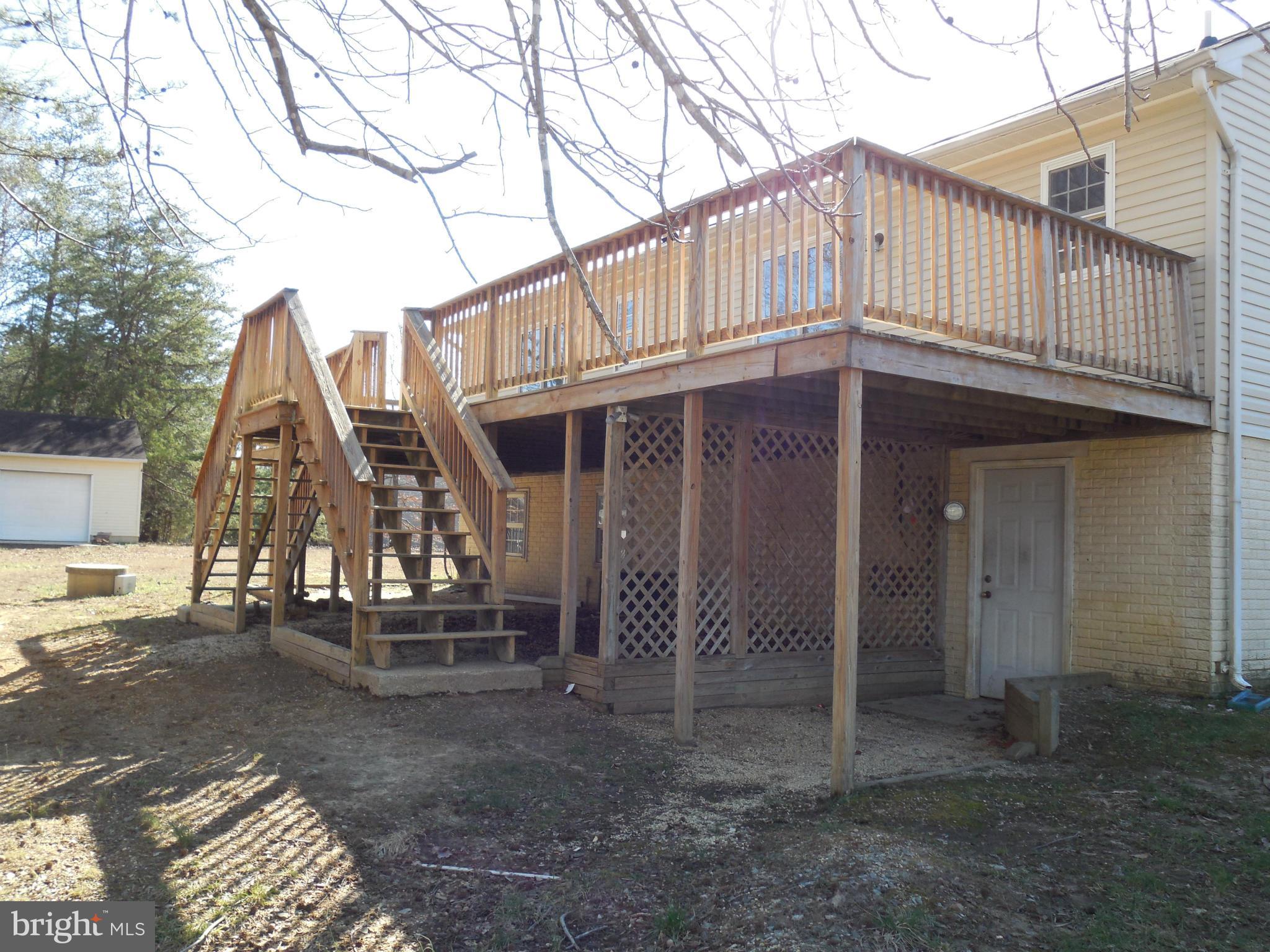 275 Cedar Ridge Drive Ruther Glen, VA 22546 - Photo 4 of 25 a view of a house with a yard
