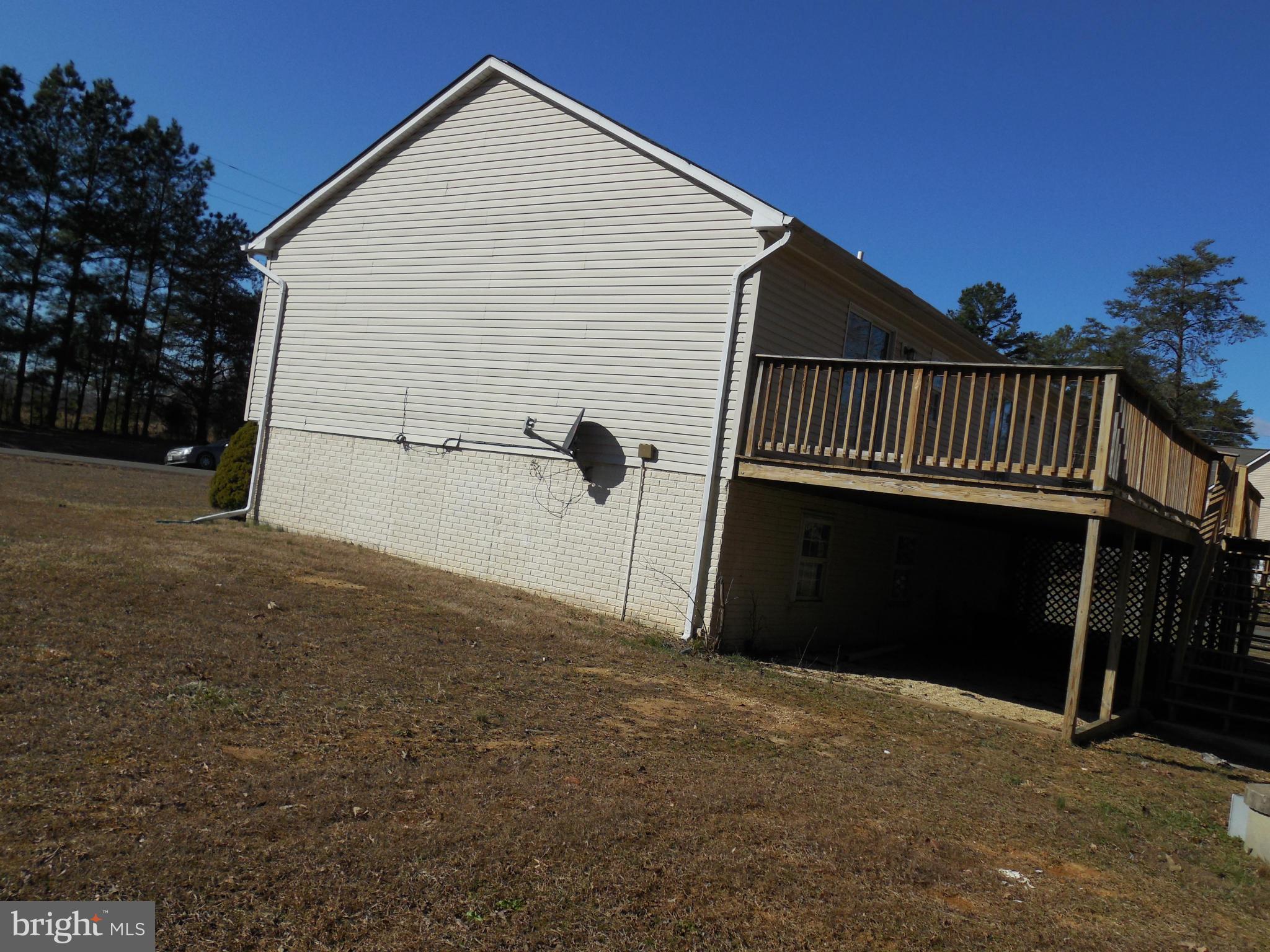 275 Cedar Ridge Drive Ruther Glen, VA 22546 - Photo 6 of 25 a view of a balcony with a street