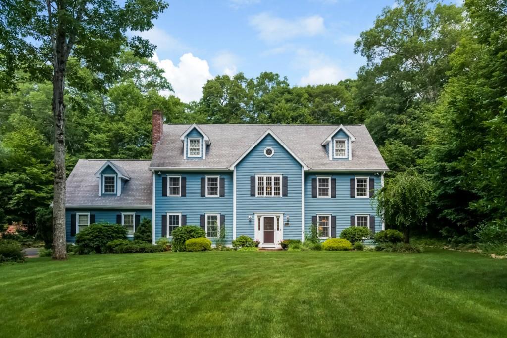 108 Blinnshed Road Madison, CT 06443 - Photo 1 of 1 a front view of a house with a garden