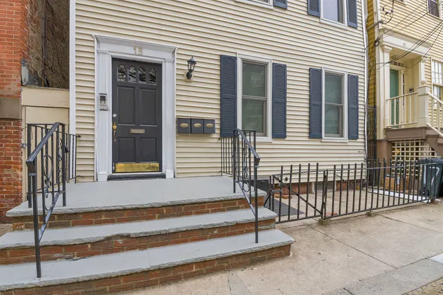 a view of a house with a small white door
