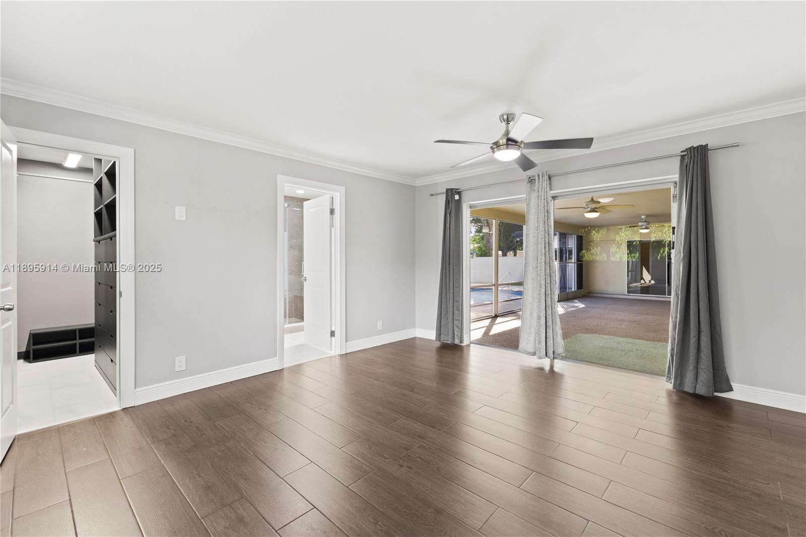 6150 Southwest 7th Street Plantation, FL 33317 - Photo 20 of 50 wooden floor in an empty room with a window