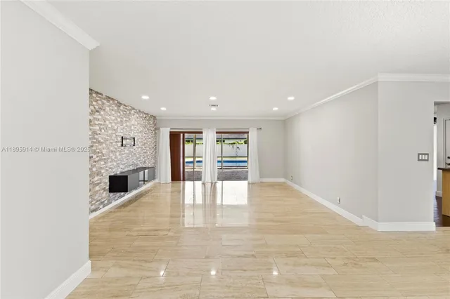 wooden floor chandelier and window in a room