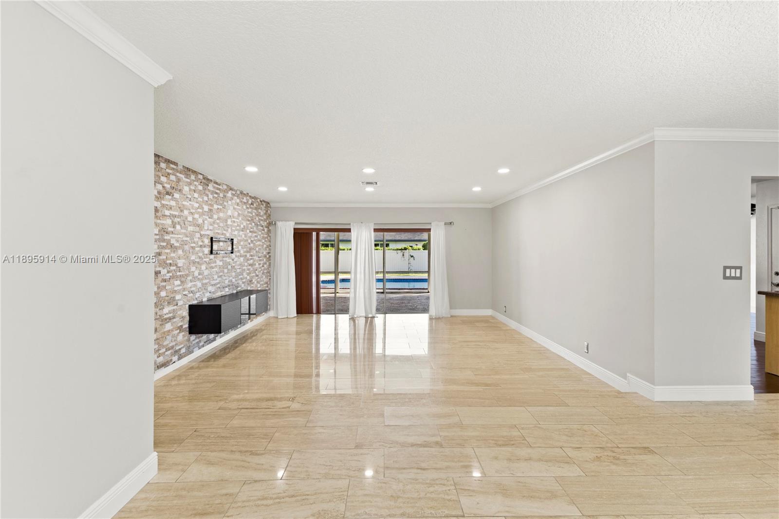6150 Southwest 7th Street Plantation, FL 33317 - Photo 7 of 50 a view of an empty room with fireplace