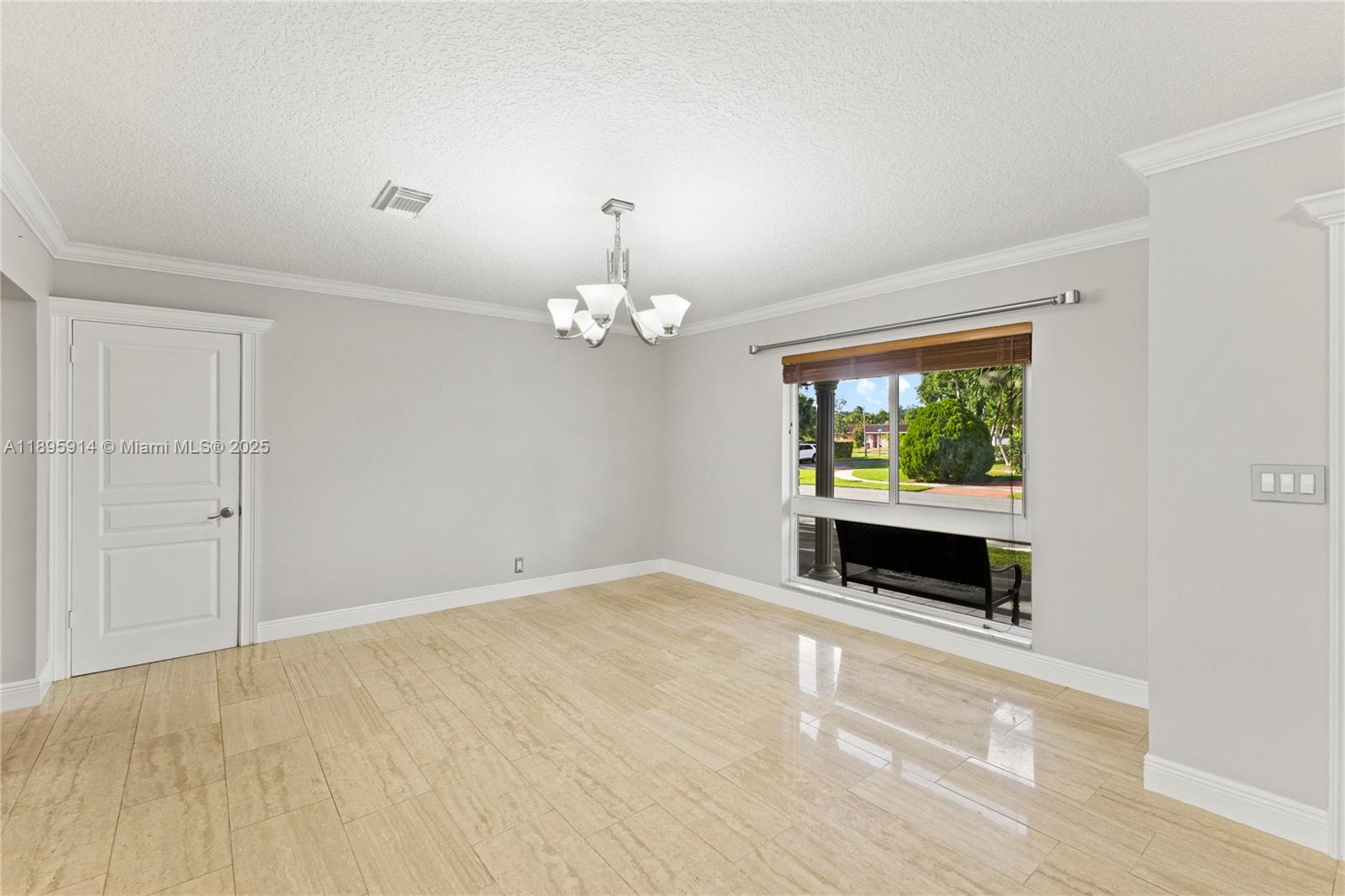 6150 Southwest 7th Street Plantation, FL 33317 - Photo 8 of 50 wooden floor chandelier and window in a room