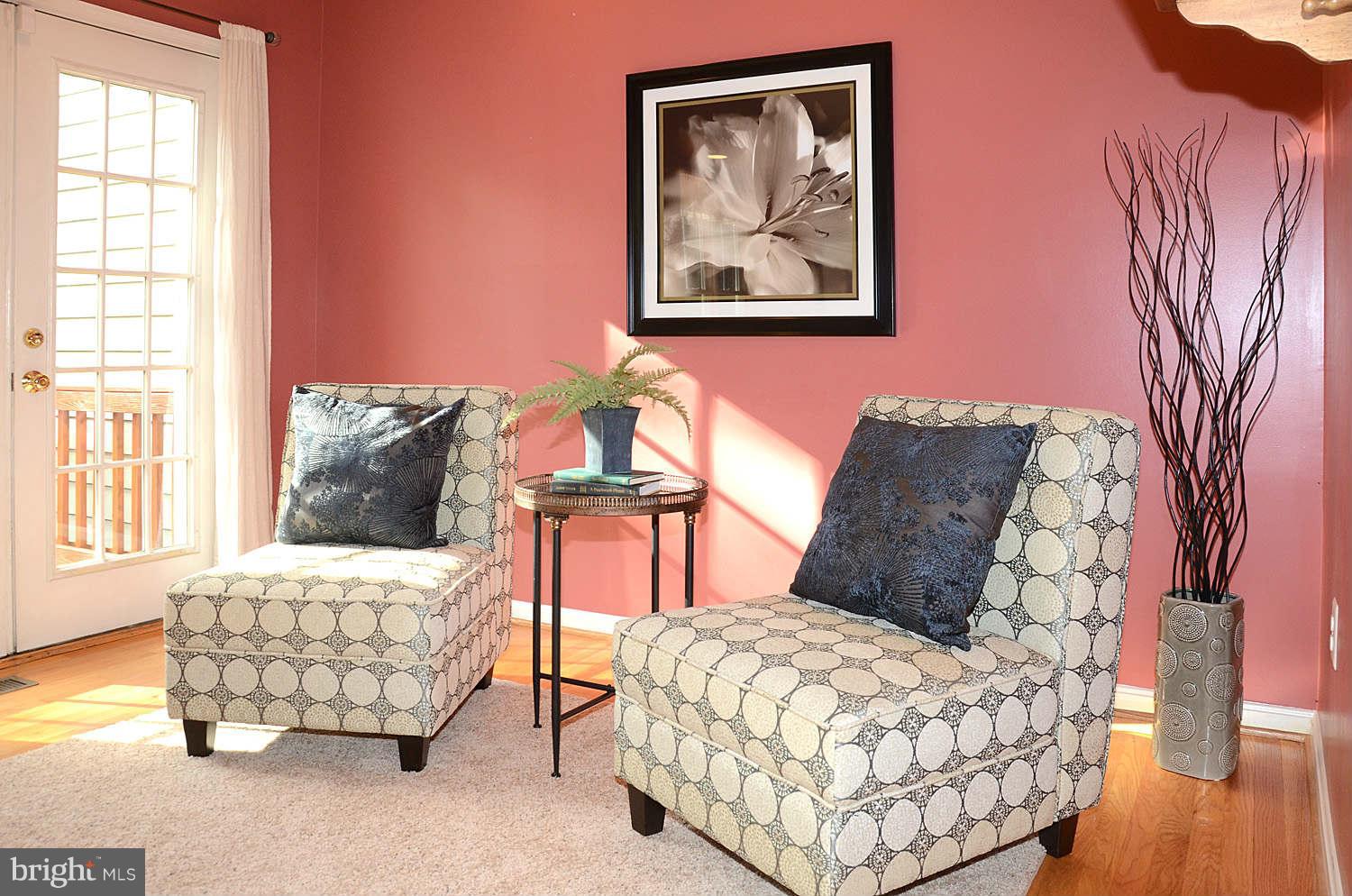1267 Weatherstone Court Reston, VA 20194 - Photo 12 of 30 a bedroom with a bed and wooden floor