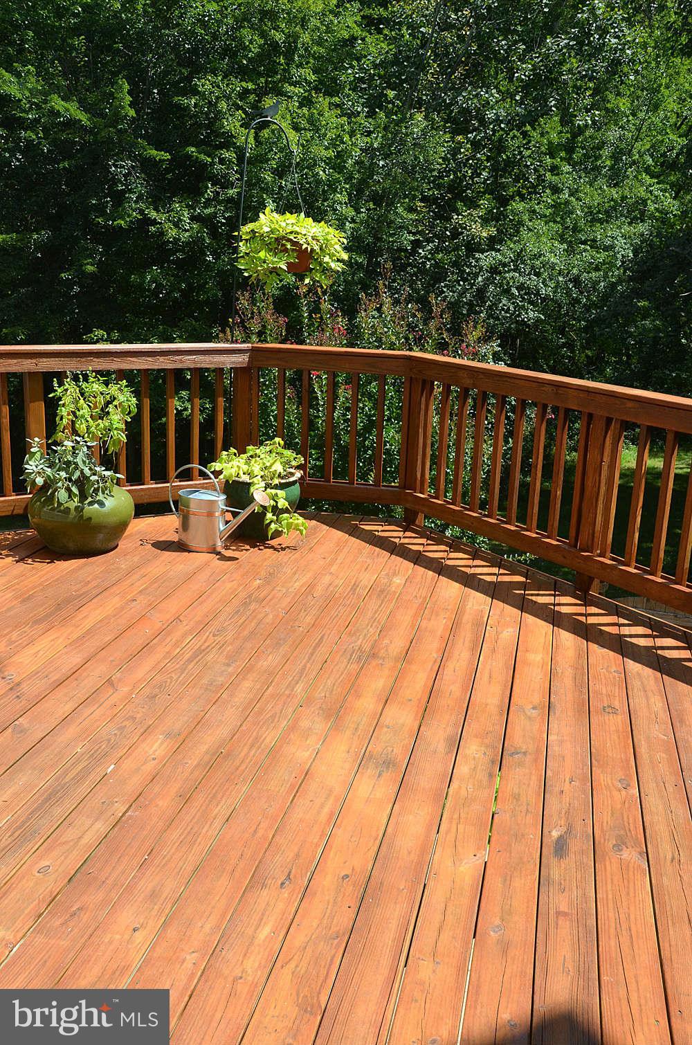 1267 Weatherstone Court Reston, VA 20194 - Photo 13 of 30 a view of balcony with wooden floor and seating space