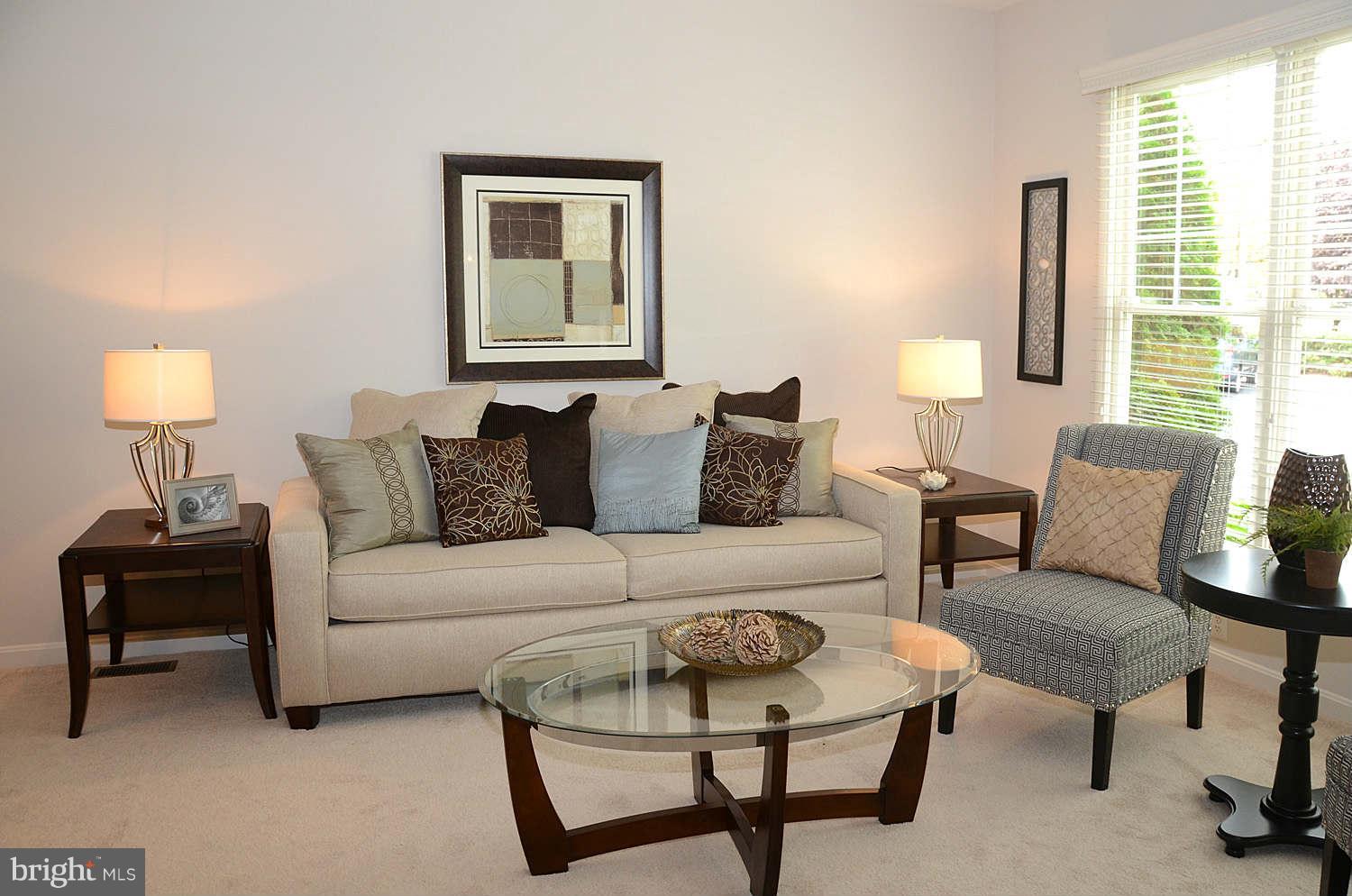 1267 Weatherstone Court Reston, VA 20194 - Photo 6 of 30 a living room with furniture and a lamp