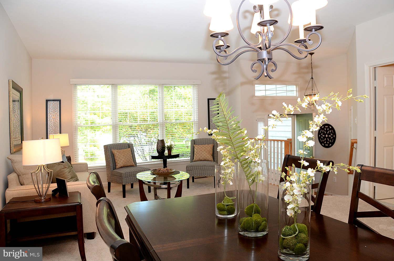 1267 Weatherstone Court Reston, VA 20194 - Photo 7 of 30 a living room with furniture and a large window