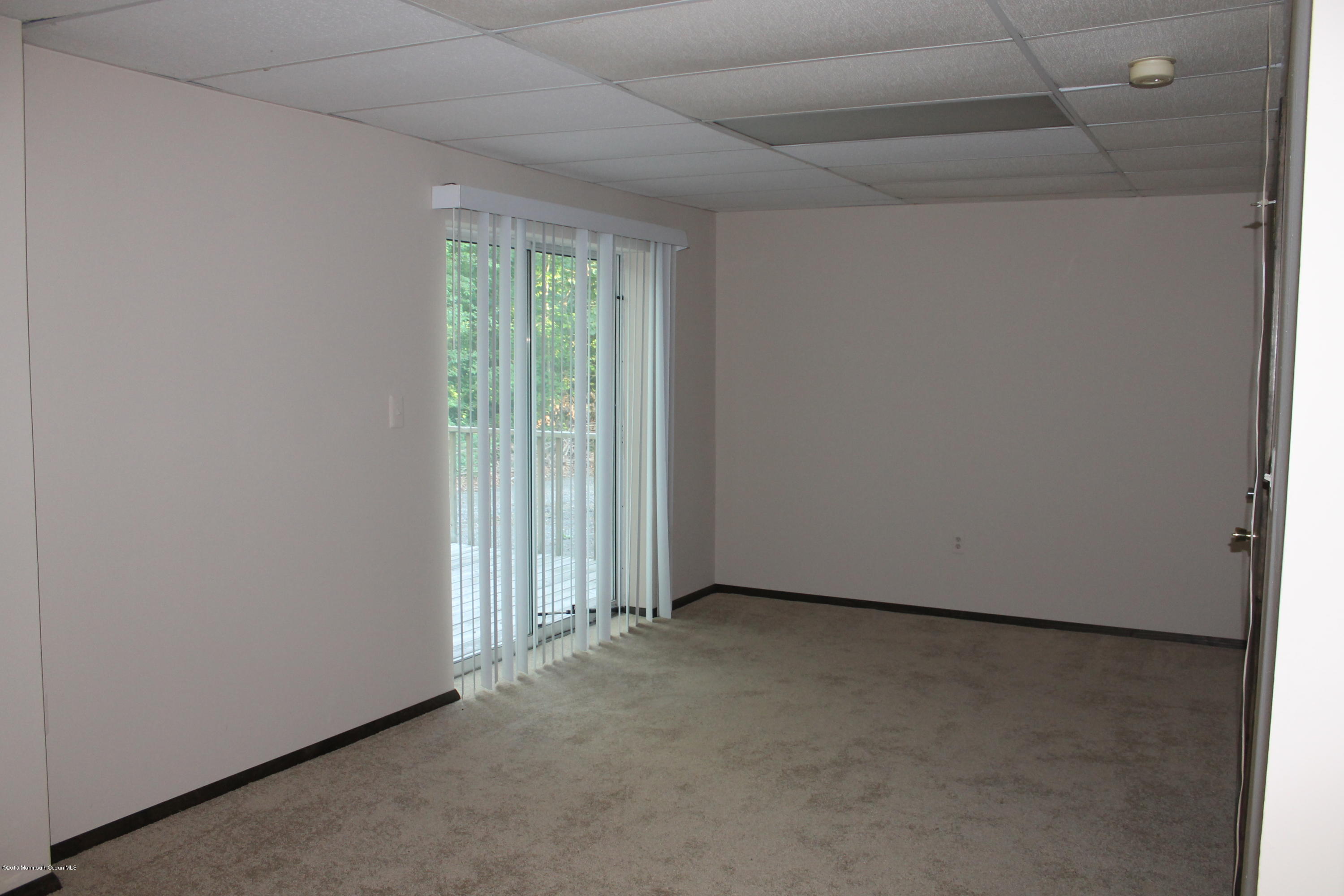 185 Cedar Swamp Road Jackson, NJ 08527 - Photo 16 of 36 a view of an empty room with a window