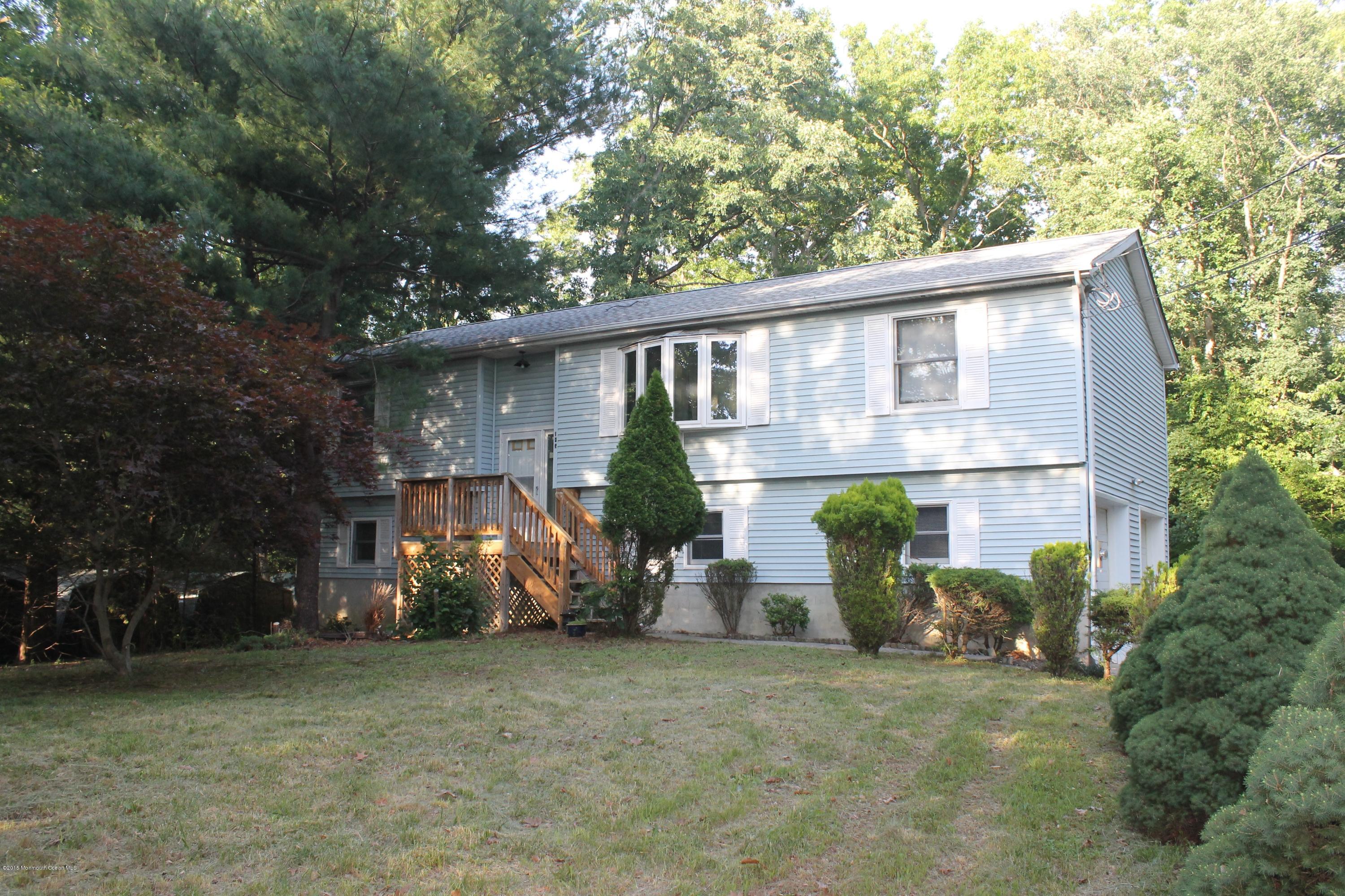 185 Cedar Swamp Road Jackson, NJ 08527 - Photo 19 of 36 a view of a house with backyard and sitting area
