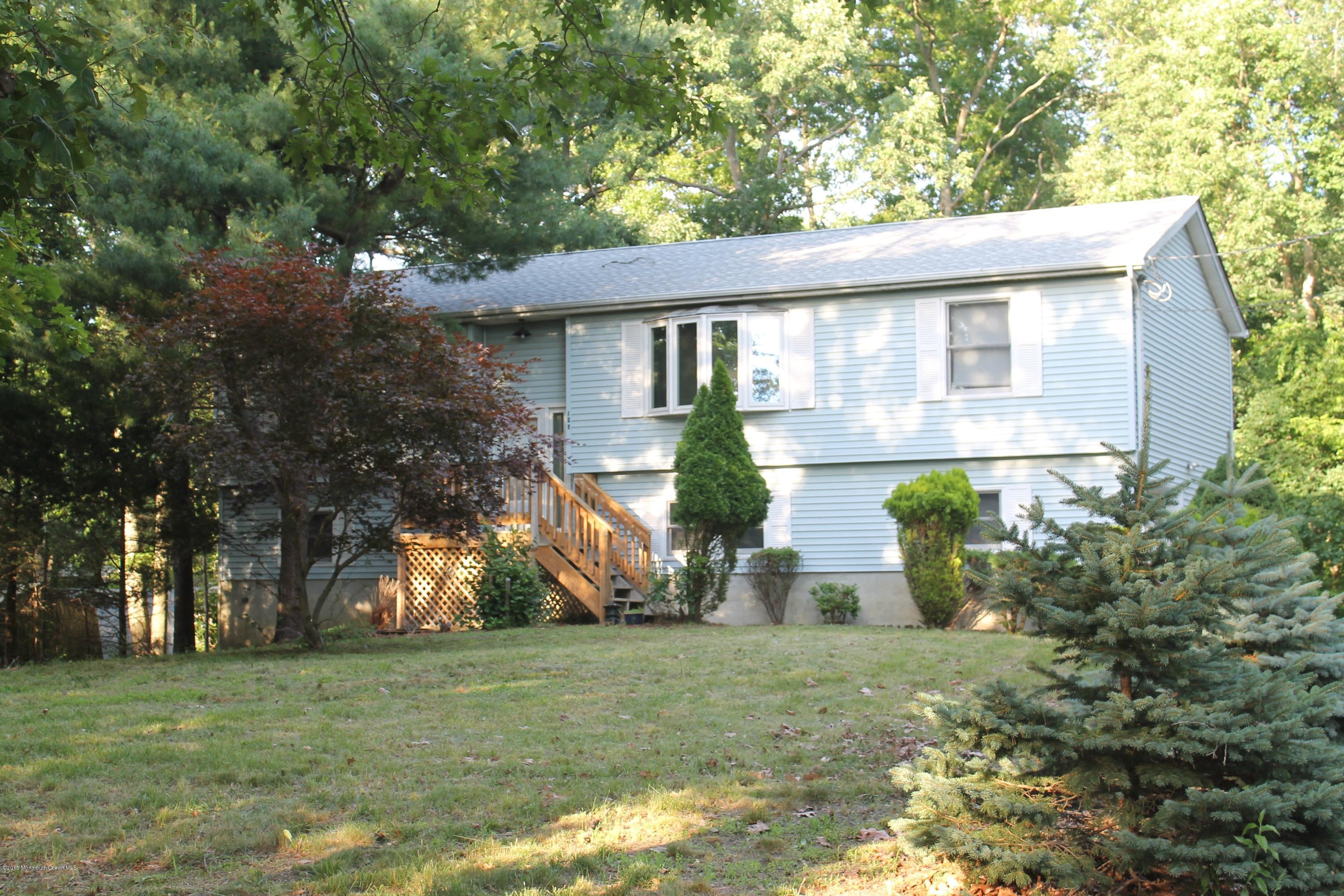 185 Cedar Swamp Road Jackson, NJ 08527 - Photo 20 of 36 a view of a house with a yard