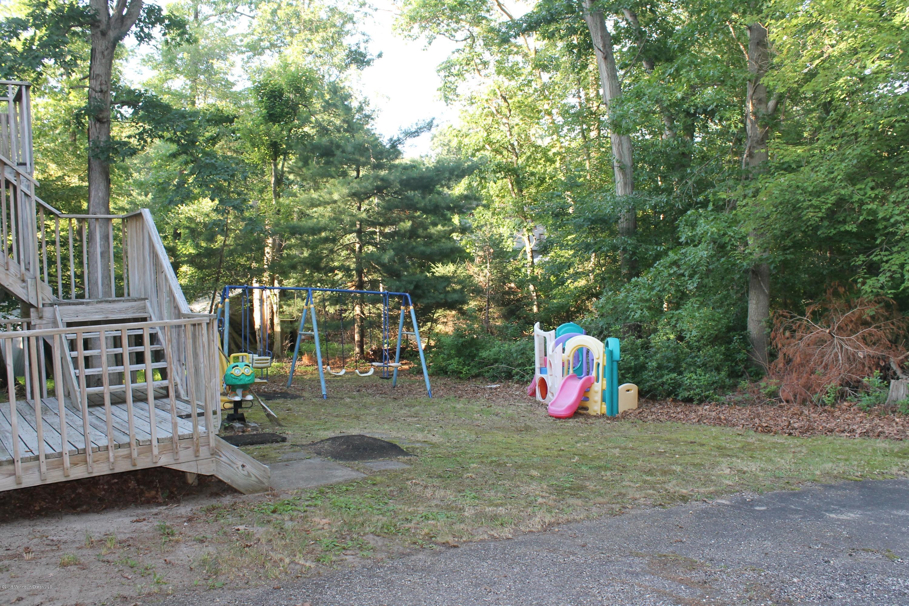 185 Cedar Swamp Road Jackson, NJ 08527 - Photo 22 of 36 a view of outdoor space with garden and entertaining space
