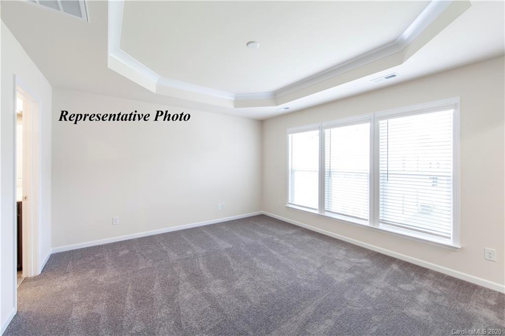 741 Elders Story Road, Unit 352 Fort Mill, SC 29708 - Photo 10 of 17 an empty room with windows