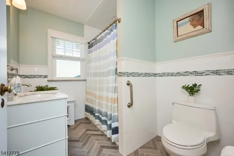 a bedroom with a bed and a table in it