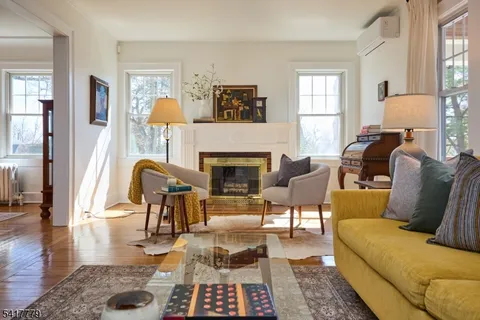a living room with furniture and a table