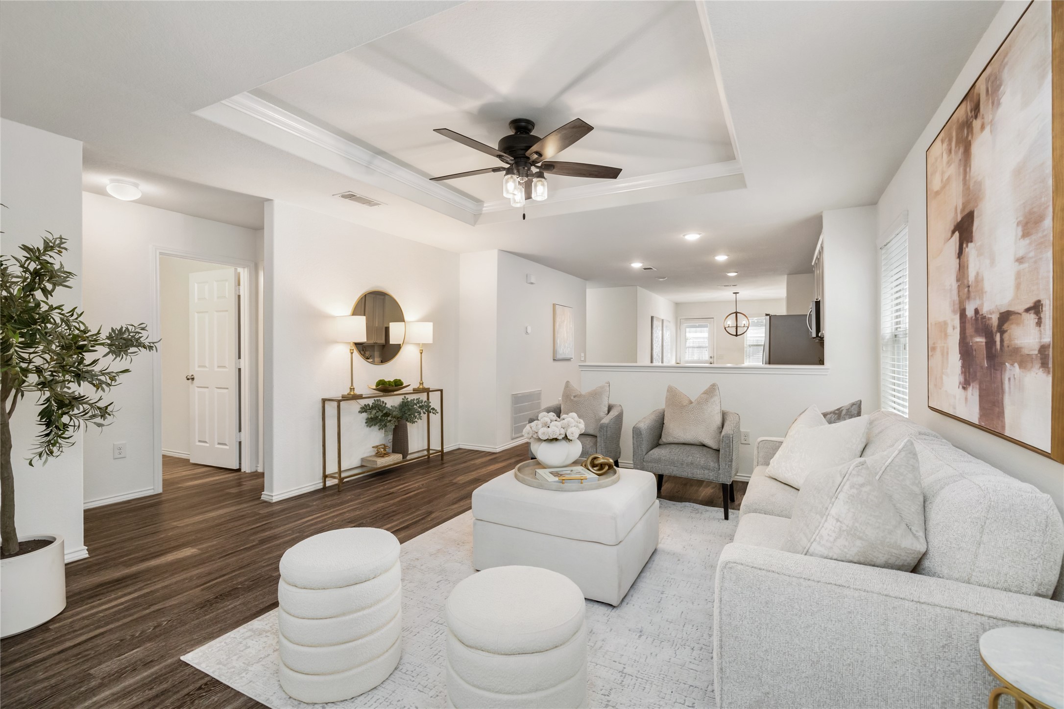 A cozy living area just off the kitchen, perfect for movie nights, casual conversations, and staying connected with everyone while you cook or entertain.