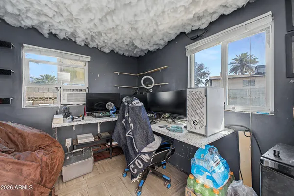 a view of house with a yard