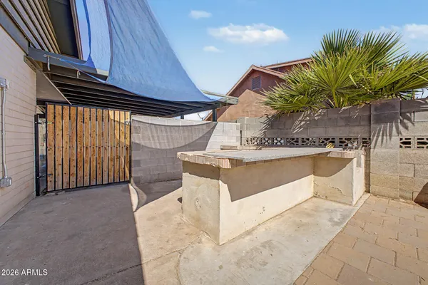 a house view with a garden space