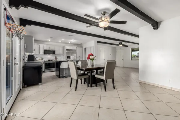 a view of a dining room with furniture