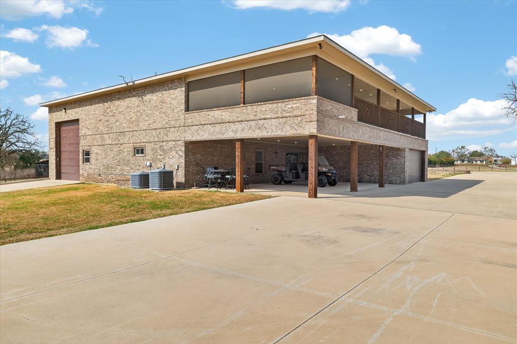 790 Bones Chapel Road Whitesboro, TX 76273 - Photo 2 of 40 a view of a building with a entrance