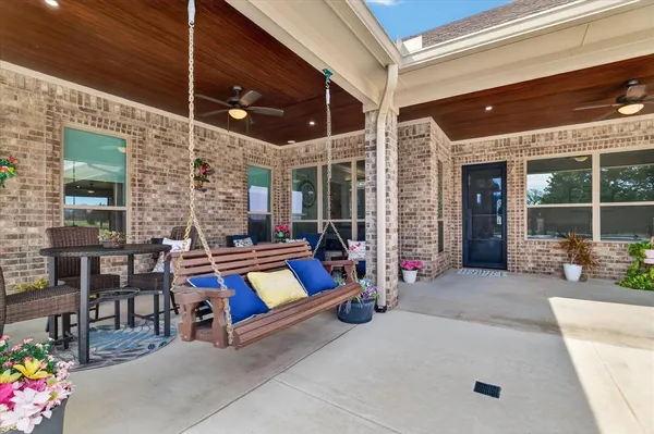 a outdoor space with lots of furniture and breakfast area