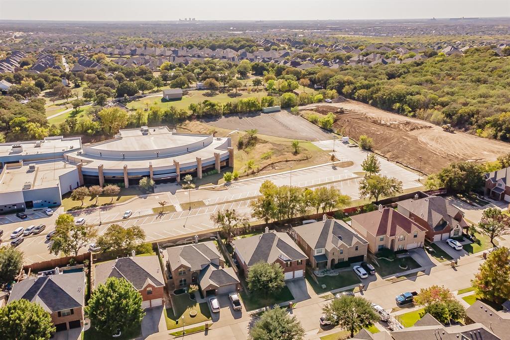 5112 Leeray Road Fort Worth, TX 76244 - Photo 33 of 34 an aerial view of a swimming pool and mountain view