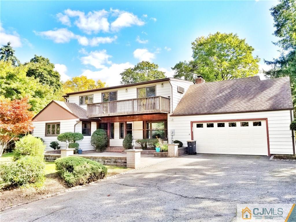 116 Emerson Road Somerset, NJ 08873 - Photo 2 of 22 a front view of a house with a garden