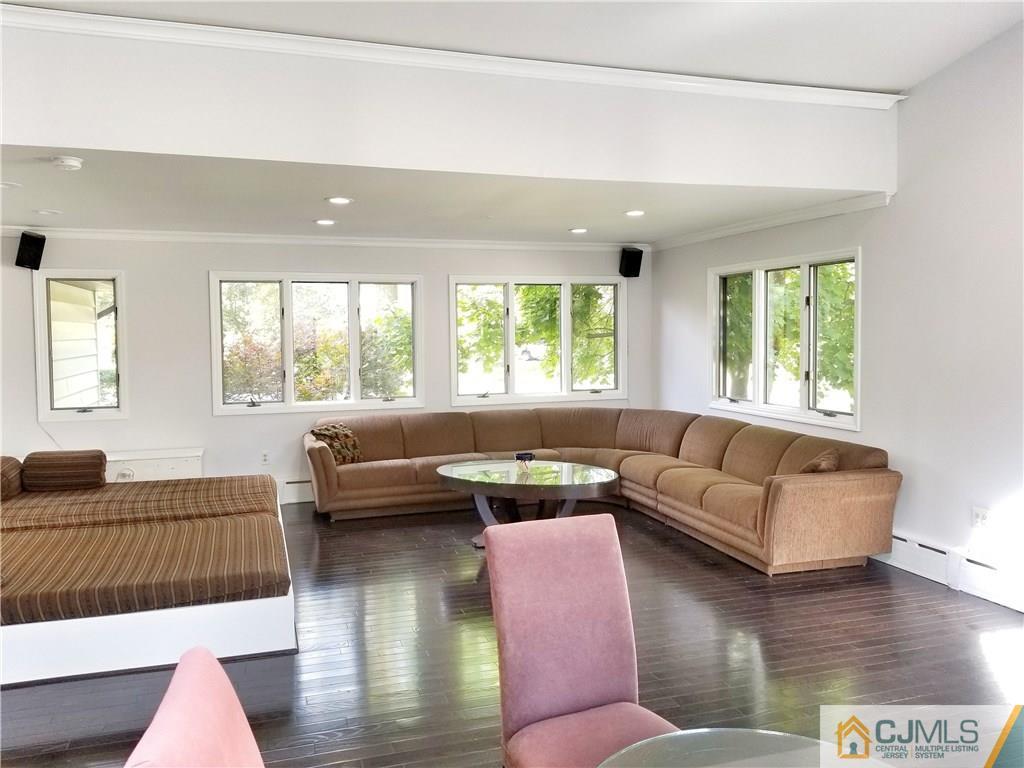 116 Emerson Road Somerset, NJ 08873 - Photo 14 of 22 a living room with furniture and a large window