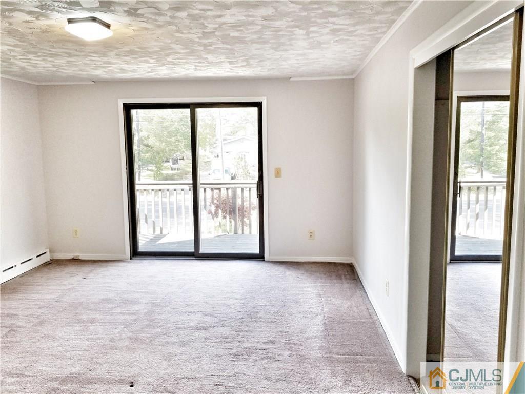 116 Emerson Road Somerset, NJ 08873 - Photo 15 of 22 an empty room with windows