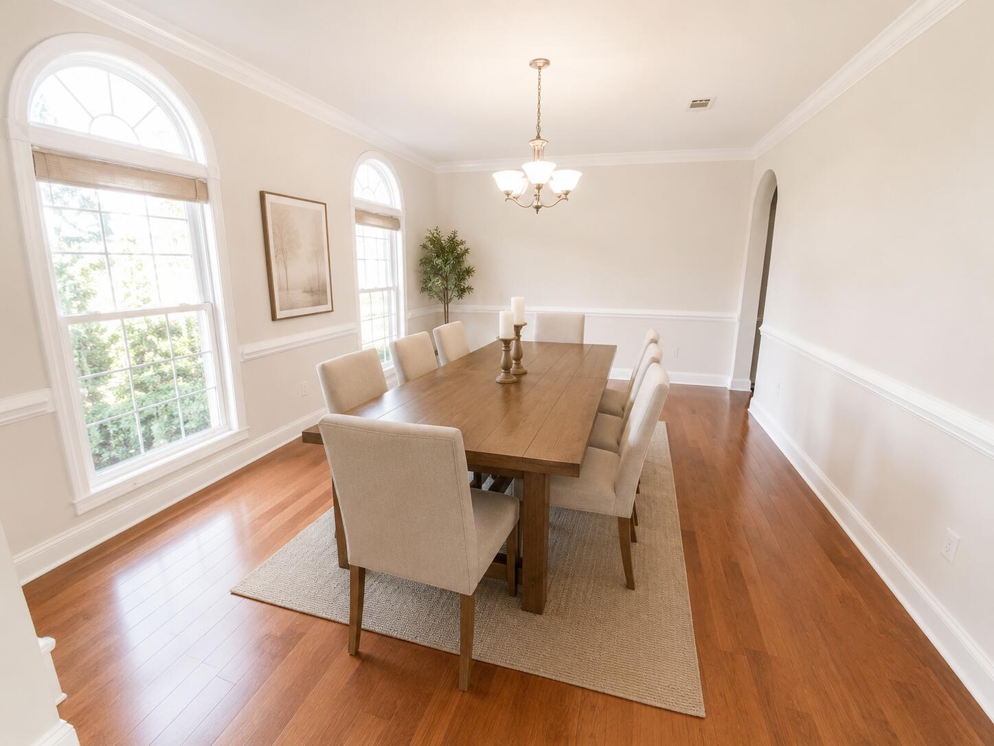 147 Dover Lane Freeport, FL 32439 - Photo 3 of 27 a view of a dining room with furniture a chandelier and wooden floor